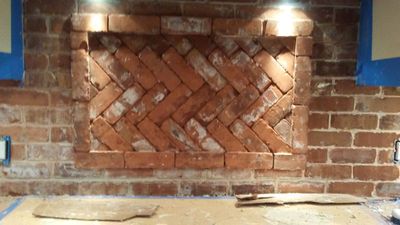 Detailed herringbone brick masonry work on a chimney in Lincoln County, Oregon