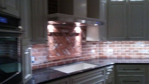 Thin brick backsplash in a custom outdoor kitchen near Newport, Oregon
