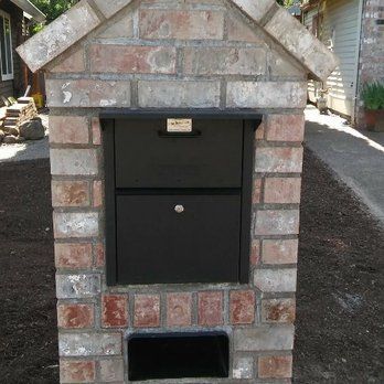 Custom brick security mailbox structure built in Newport, Oregon