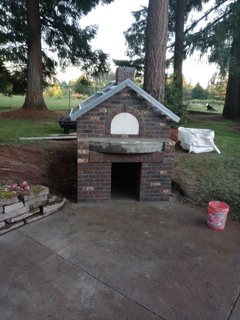Brick outdoor fireplace masonry project by Steve Smith Masonry in Lincoln County, Oregon