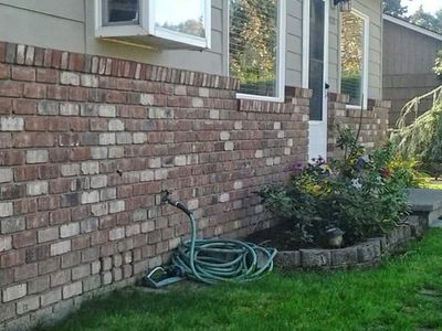 Brick veneer wall exposed to coastal weather in Lincoln County, Oregon